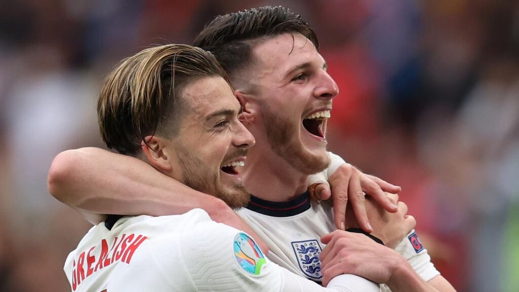 Former Irish players Jack Grealish and Declan Rice celebrate reaching the quarter-finals of Euro 2020 with England. Photograph: Catherine Ivill/Getty Images