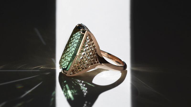 Labyrinth - green tourmaline with diamonds set underneath in 18ct yellow gold