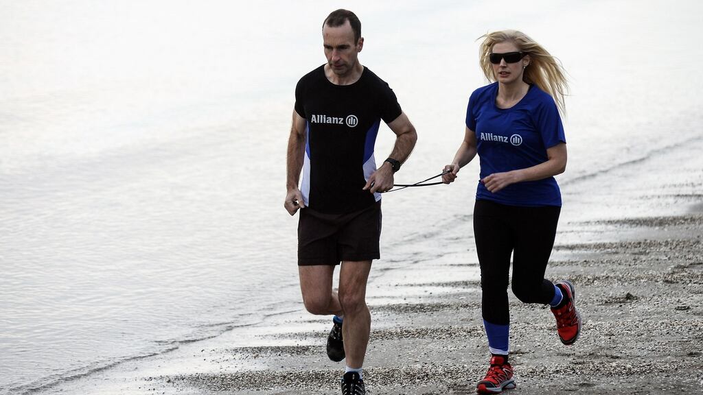 Sinéad Kane and running partner John O’Regan: For the past two years, Sinéad has been training and racing with the aim of qualifying for the World Championship 24-hour race, to be held in Albi, France in October. Photo by Sam Barnes/Sportsfile