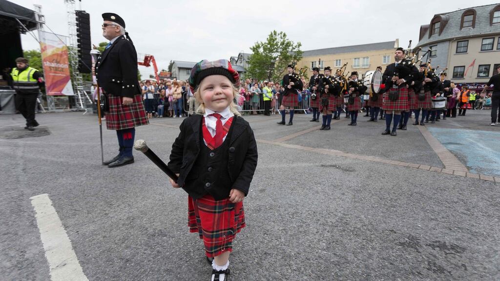 Two-year-old Clodagh Purcell leading the CBS Limerick Pipe band at the the opening parade of Fleadh Ceoil na hÉireann in Ennis, Co Clare. Photograph: Eamon Ward