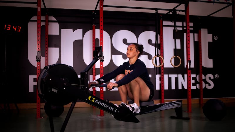 Emma McQuaid training at Trinity College gym: she has a gymnastics coach, a swim instructor, and a weightlifting trainer