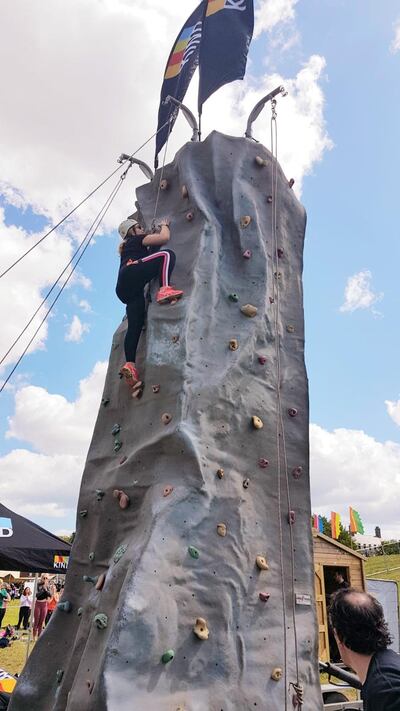 Rachel Flaherty takes on the climbing wall at Wellfest festival in Dublin.