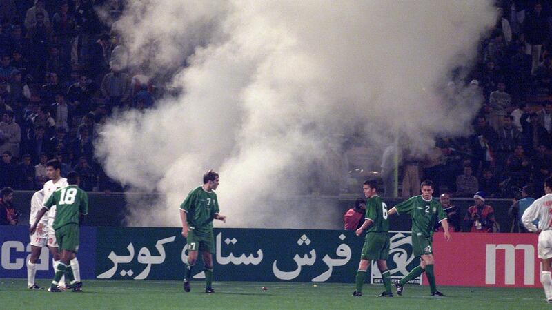Flares go off in the crowd during the first leg of Ireland’s playoff with Iran in 2001. Photo: Patrick Bolger/Inpho
