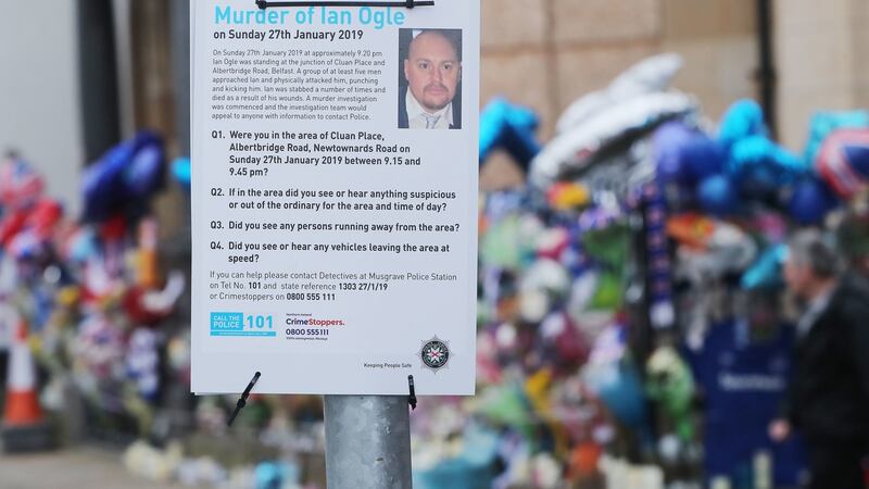 A police notice appealing for information about the death of Ian Ogle. Photograph:  Niall Carson/PA Wire