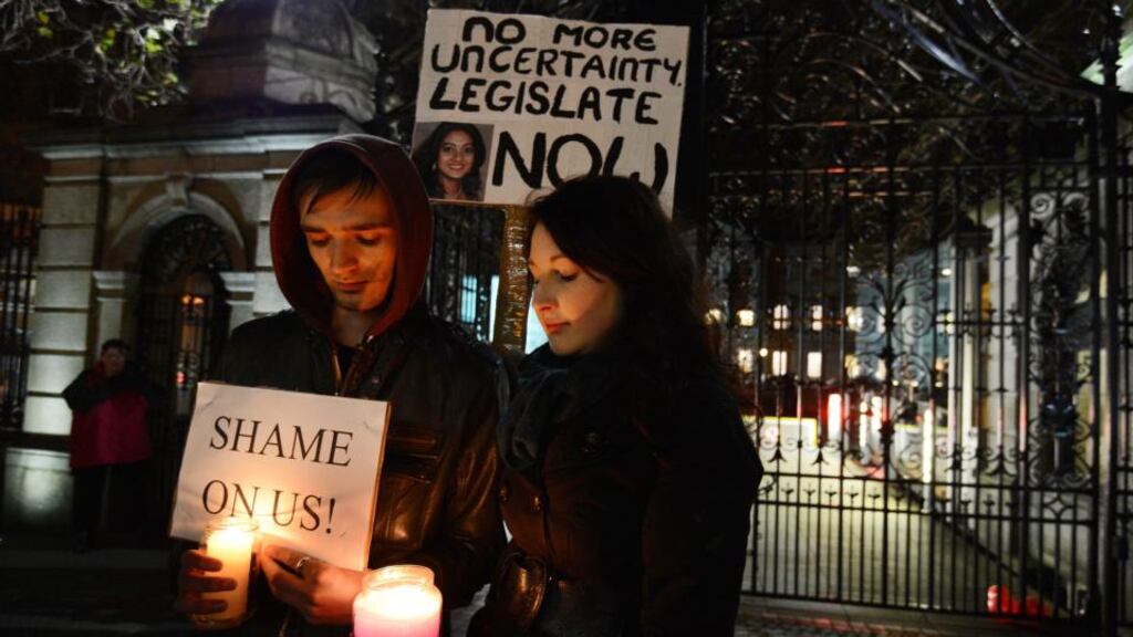 ‘The debate on the legislation was overshadowed by public outrage at the tragic death in October 2012 of Savita Halappanavar, which highlighted the urgent need to provide clarity on the carrying-out of life-saving abortions’. Above, a protest outside the Dáil following Savita Halappanavar’s death. Photograph: Alan Betson / THE IRISH TIMES