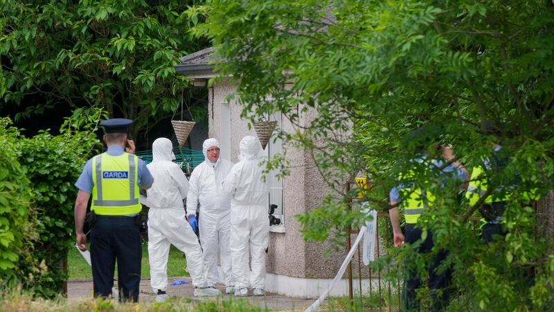 Gardaí at the scene off Maglin road, Ballincollig, Co Cork where a man died and his partner was   injured following an attack by a number of men armed with weapons. Photograph: Daragh Mc Sweeney/Provision