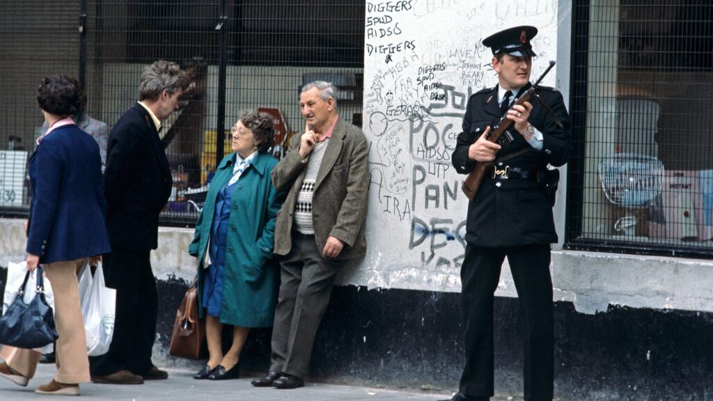 An RUC man on patrol in Belfast during the Troubles. Photograph: Alain Le Garsmeur/Getty Images