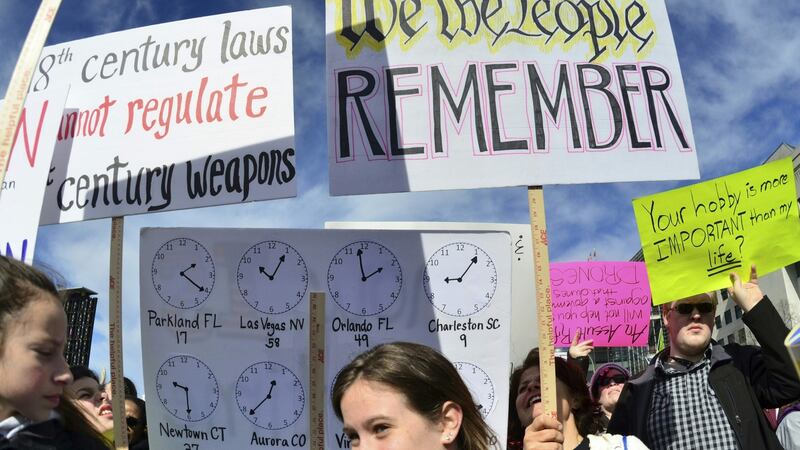People display protest signs at the March for Our Lives rally in Washington, DC on Saturday. Photograph: Eva Hambach/AFP/Getty Images