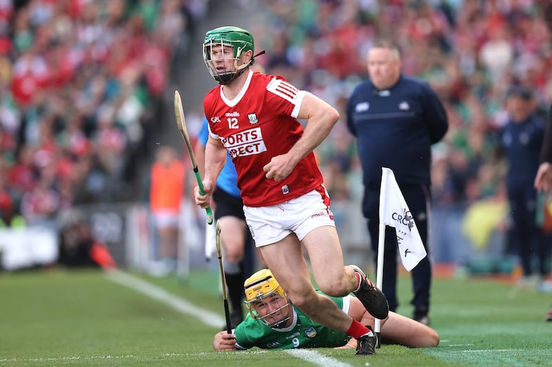 Cork's Séamus Harnedy eludes Limerick's Limerick's Cathal O’Neill . Photograph: Bryan Keane/Inpho