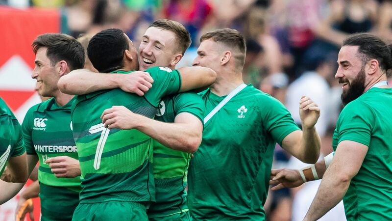 Ireland’s Jordan Conroy and Terry Kennedy celebrate at full time after victory over Hong Kong. Photograph: Yu Chun Christopher Wong/Inpho