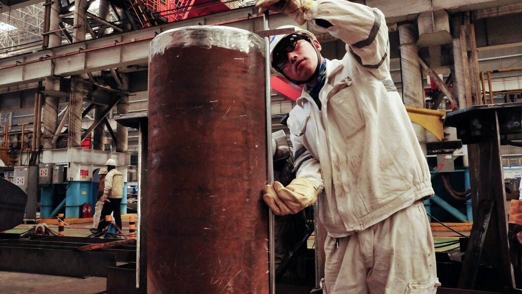 Chinese manufacturing activity expanded in March for the first time in nine months, official data showed on April 1, while a private survey indicated the smallest decline for more than a year in positive signals for the world’s second-largest economy. (Photograph: ASTR / China OUTSTR/AFP/Getty Images)