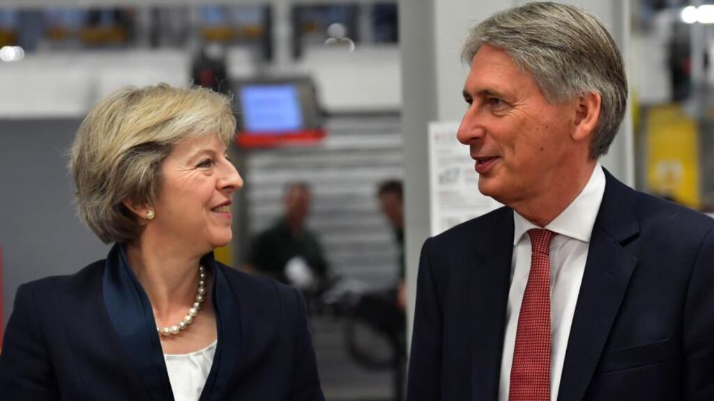 British prime minister Theresa May and chancellor of the exchequer Philip Hammond. Photograph: Carl Court/PA Wire