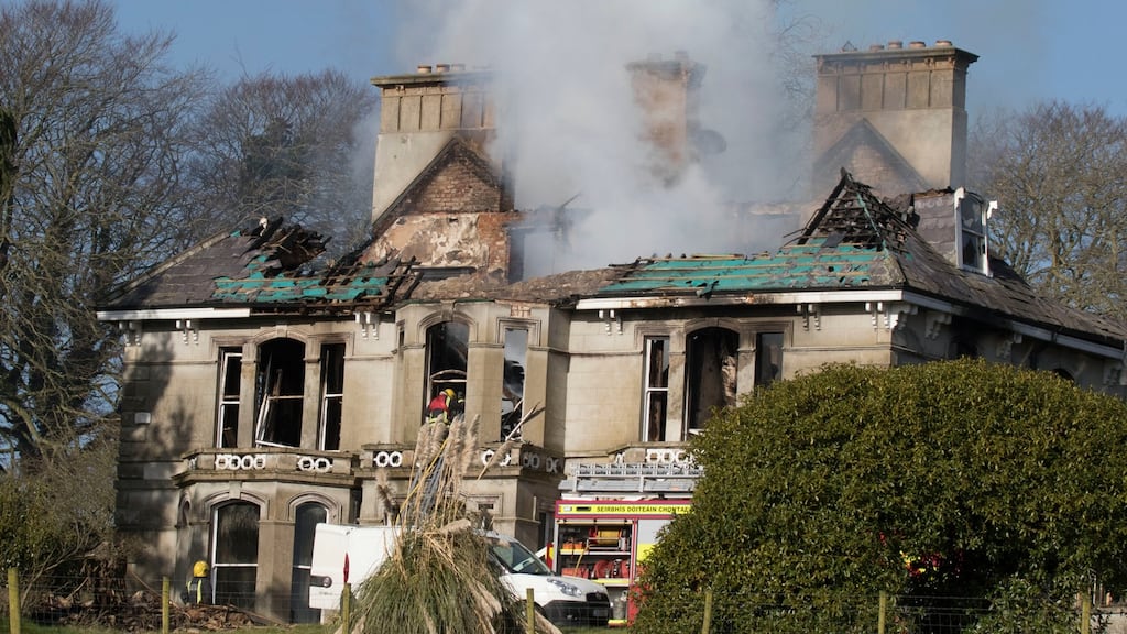 Firefighters at the scene of the blaze which destroyed Donaghmore House on the outskirts of Castlefin, Co Donegal. Photograph: North West Newspix