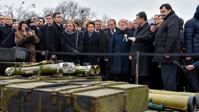Ukrainian president Petro Poroshenko (4th from right), president of the European Council Donald Tusk (centre right), president of Lithuania Dalia Grybauskaite (6th from right), president of Poland Bronislaw Komorowski (centre left) and other officials and other foreign dignitaries eye Russian-made weaponry which Poroshenko claims his troops had captured from separatist rebels during battles in the east of Ukraine, as they visit an open air exhibition in Kiev, Ukraine, this week. Photograph: Mykhaylo Markiv/EPA