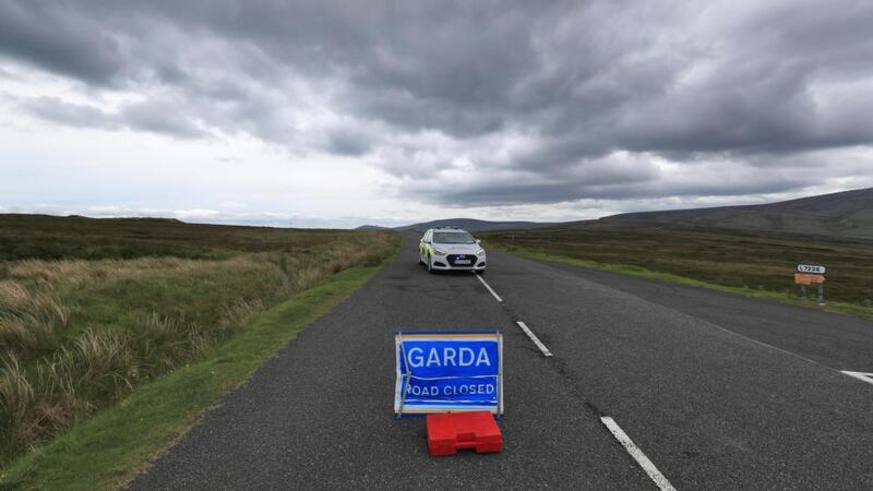 Patricia O’Connor murder case: the Garda closed Old Military Road, in the Wicklow Mountains, after the discovery of body parts. Photograph: Colin Keegan/ Collins