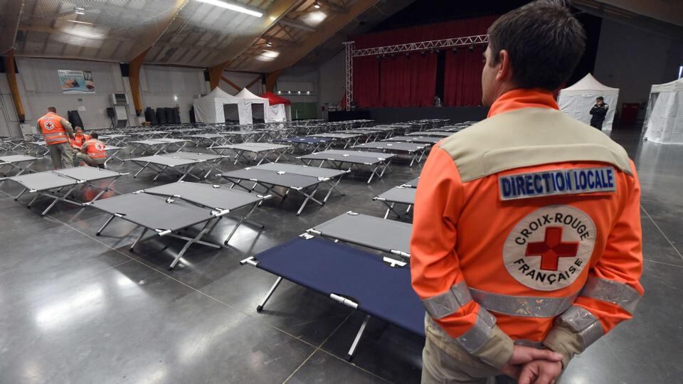 French Red Cross staff wait to greet the families of victims of the Germanwings Airbus A320 in Digne-les-Bains. Photograph: Pascal Guyot/AFP