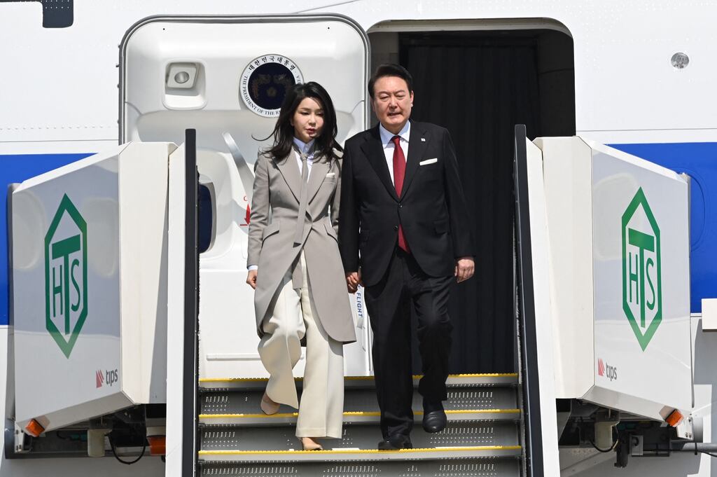 South Korean president Yoon Suk Yeol and his wife Kim Keon Hee arrive at Tokyo's Haneda Airport on March 16th, 2023. Photograph: KAZUHIRO NOGI/AFP via Getty Images