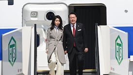 South Korean president arrives in Japan for historic talks