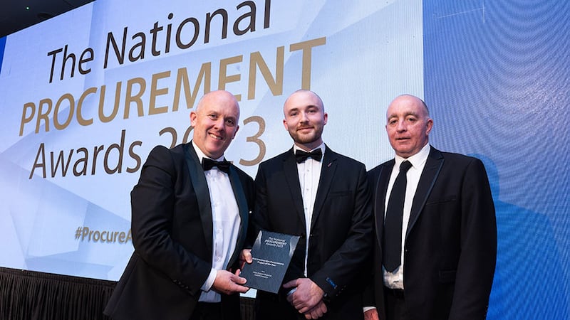 Thomas Hickey, community lead at BusinessRiver, presents the best construction procurement project of the year award to Mark Callanan and Paul Gray, Uisce Éireann