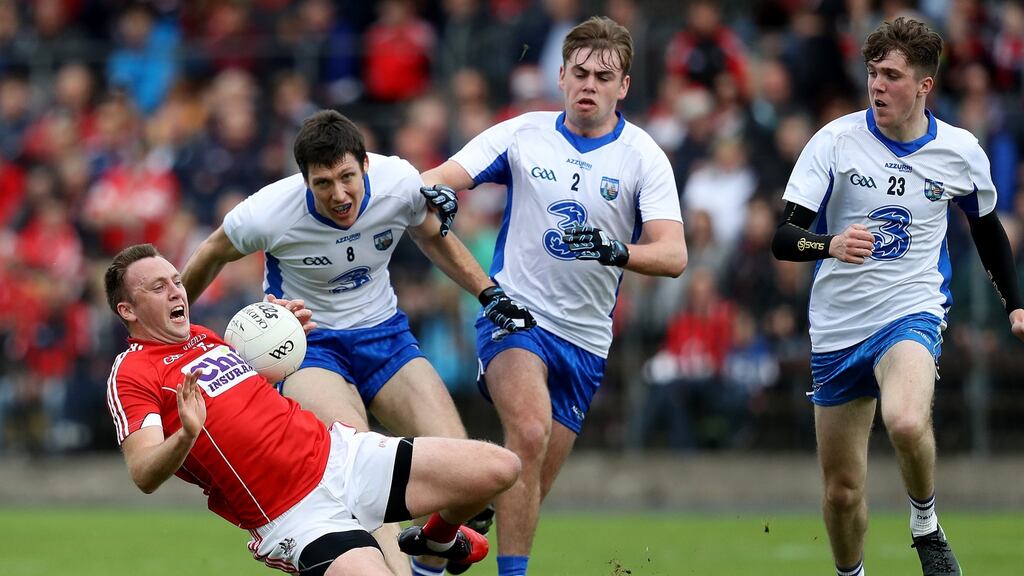 Cork’s Paul Kerrigan is challenged during his side’s narrow Munster SFC win over Waterford. Photograph: Tommy Dickson/Inpho