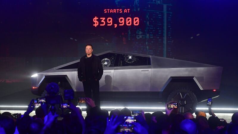 Elon Musk with Tesla’s newly unveiled all-electric battery-powered Cybertruck in November 2019. Photograph: Frederic J Brown/AFP via Getty Images
