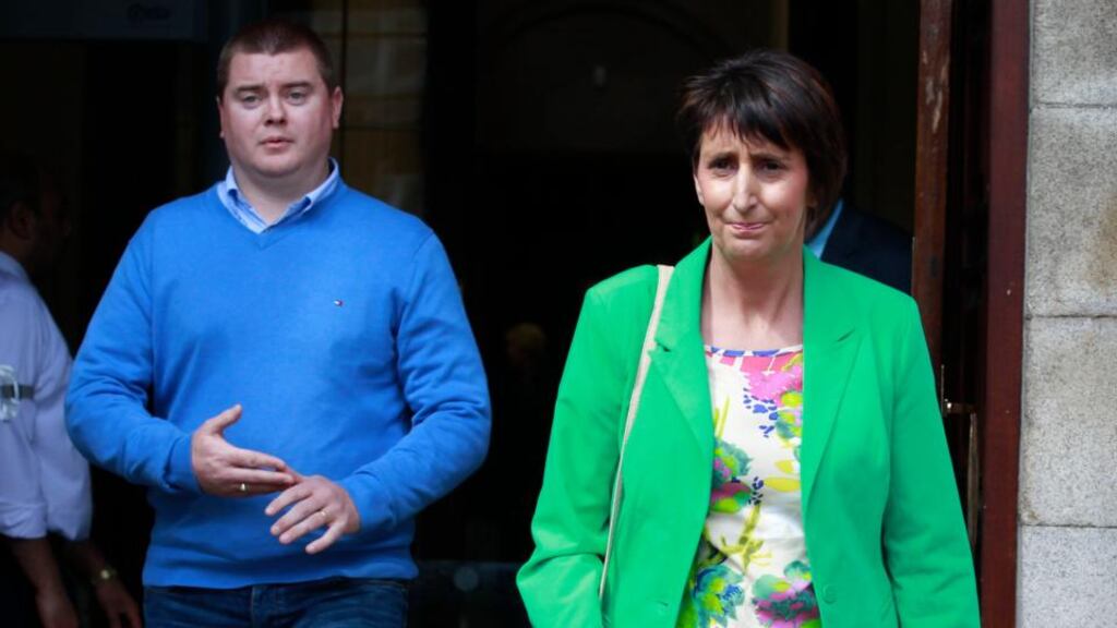 Raymond and Lorraine Brennan leave court yesterday after the High Court approved an interim settlement on behalf of their son Ryan. Photograph: Collins