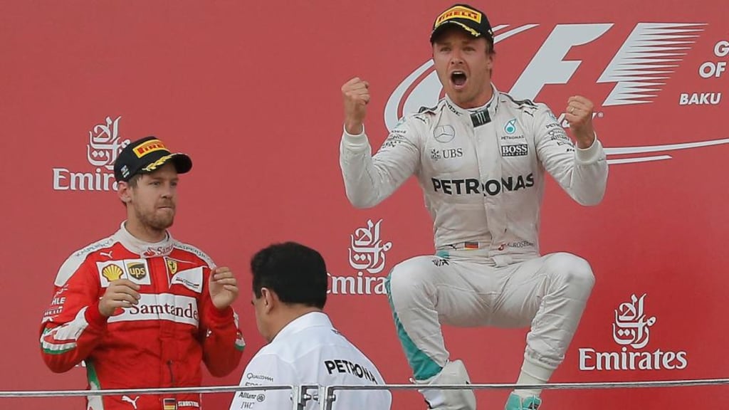 Mercedes driver Nico Rosberg celebrates winning the Grand Prix of Europe in Baku next to Ferrari’s Sebastian Vettel, who finished second. Photograph: Maxim Shemetov/Reuters