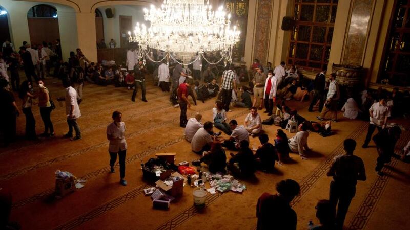 Protesters and medical workers at a makeshift field clinic in a mosque in Istanbul. Photograph Ed Ou/The New York Times.