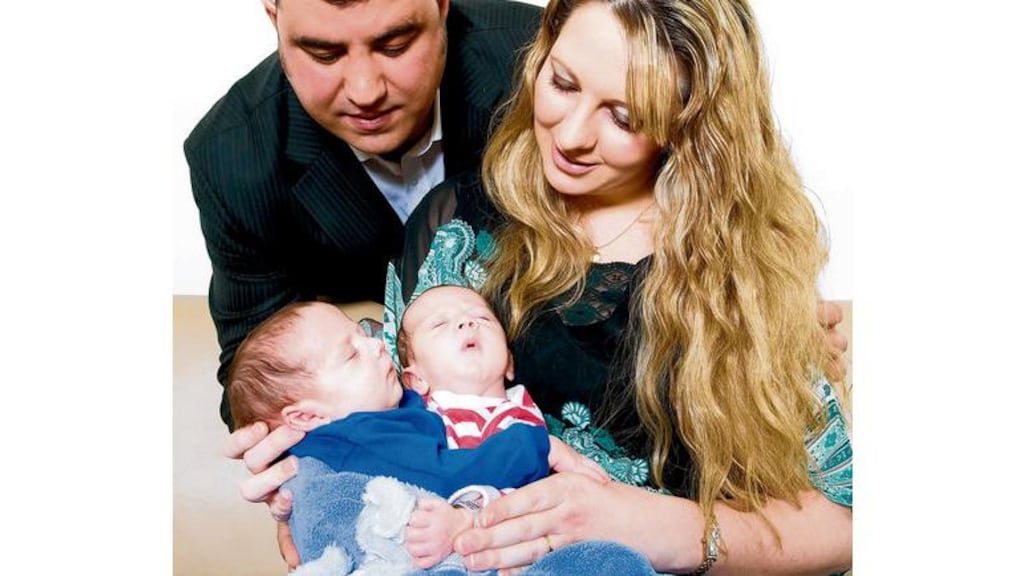 Conjoined twins Hassan and Hussein Benhaffaf, with their mum and dad, Angie and Azzedine Benhaffaf. Photograph: Daragh Mc Sweeney/Provision