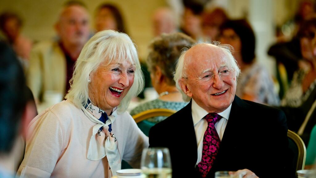 President Michael D Higgins meeting with Deena Cotter from Dún Laoghaire during the afternoon tea party in Áras an Uachtaráin on Monday. Photograph: Maxwell’s