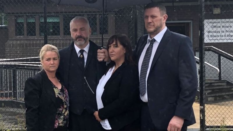 Outside the court, the defendants’ brother Mark Lauro (second from left) with his wife Bernadette Lauro (on left) and his sister Diane Aston, here with her husband Neil Aston (right), read a prepared statement. Photograph: Paul Higgins