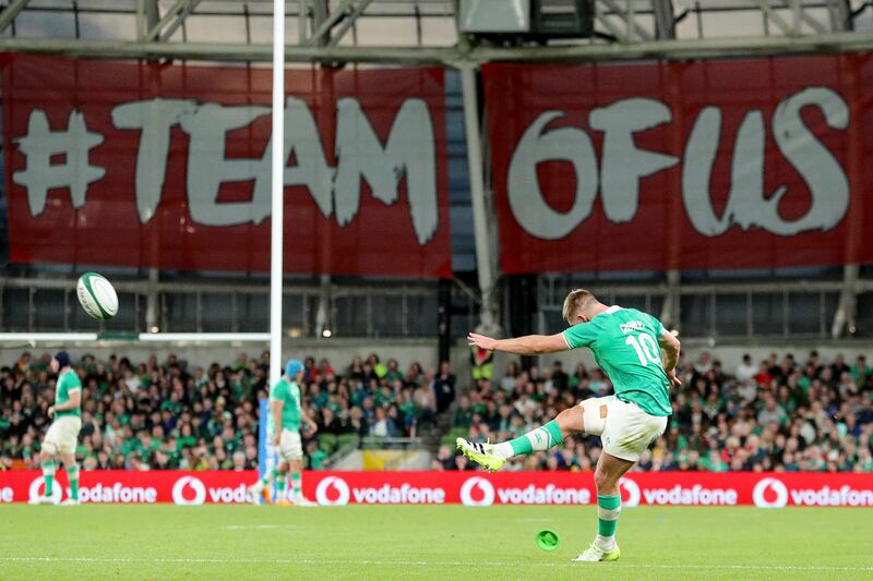 Ireland outhalf Jack Crowley takes a conversion. Photograph: Ben Brady/Inpho
