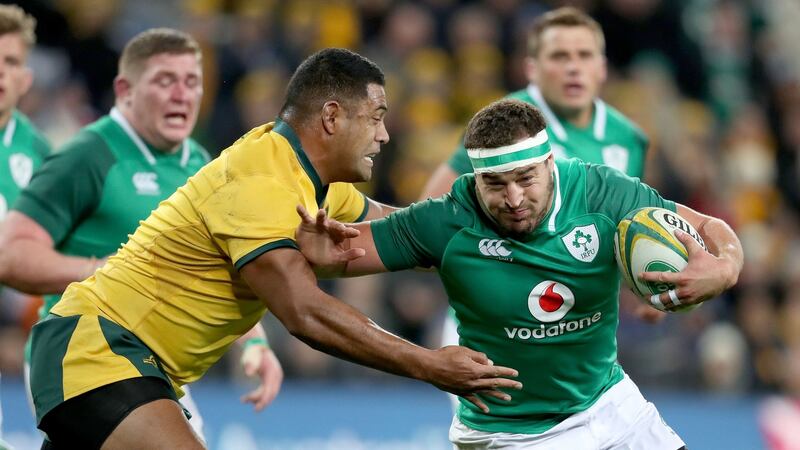 Rob Herring goes past Scott Sio during Saturday’s win for Ireland. Photo: Dan Sheridan/Inpho