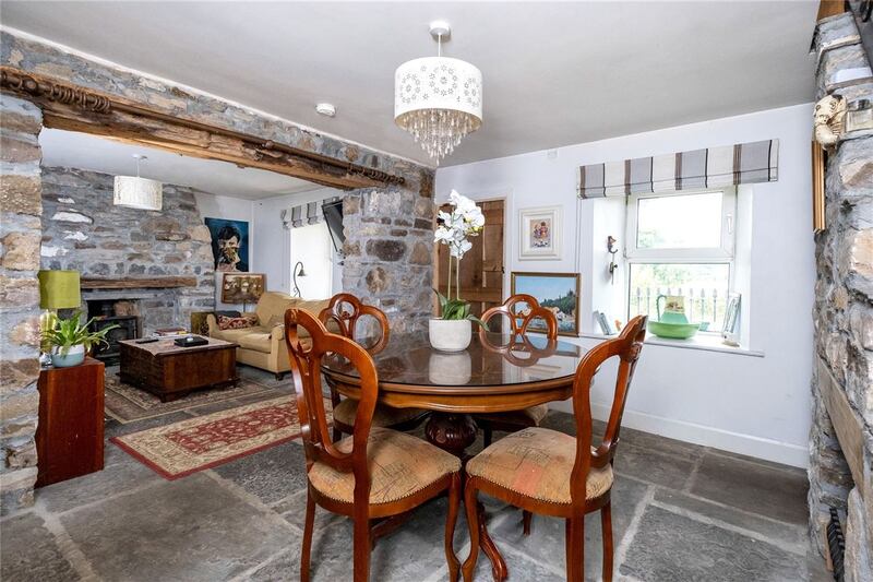 Stone walls create a beautiful feature throughout the house