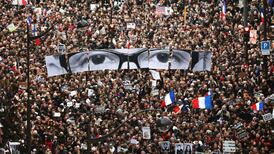 Defiance and fraternity as millions march in France