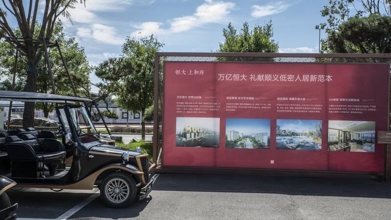 A billboard promoting the  Evergrande Royal Mansion residential development under construction in Beijing. Photograph: Gilles Sabrie/Bloomberg