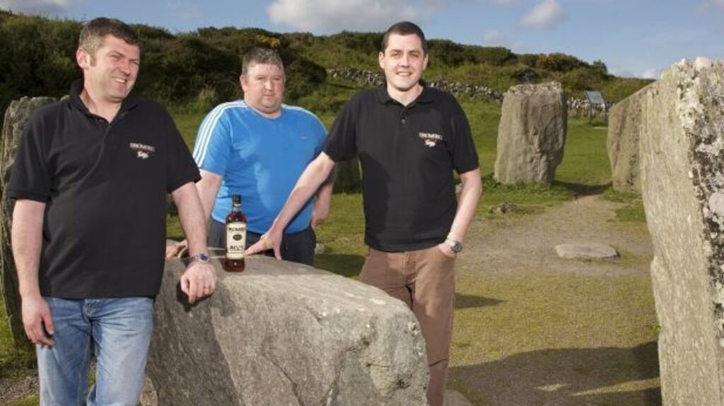 West Cork Distillers founder John O’Connell (right), with co-founders Denis and Ger McCarthy. Photograph: Neil Danton