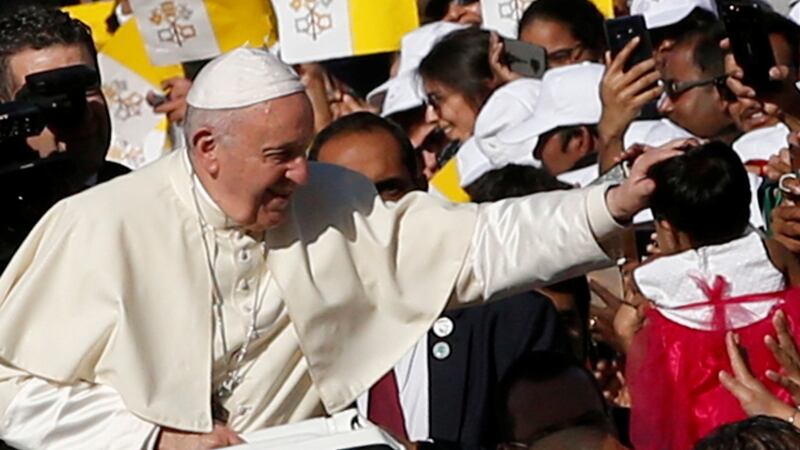 Pope Francis blesses a child as he leads the papal mass at Zayed Sports City, Abu Dhabi. Photograph: Ali Haider/EPA
