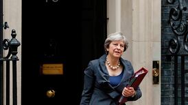 May heads for Brussels after Brexit talks deadlock