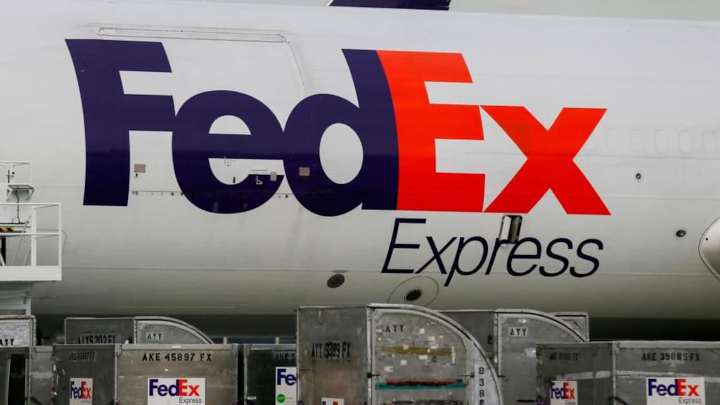 A FedEx cargo plane waits to be loaded. FedEx profits have not met expectations.