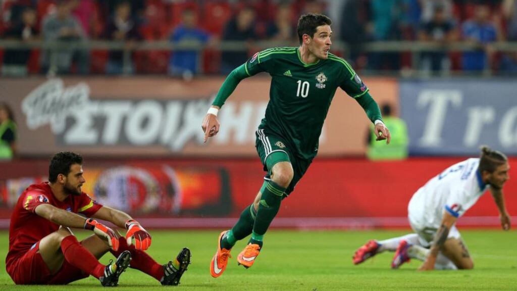 Northern Ireland’s Kyle Lafferty celebrates scoring their second goal in the Euro 2016 qualifier against Greece at Stadio Georgios Karaiskakis in Piraeus. Photograph: William Cherry/Inpho/Presseye