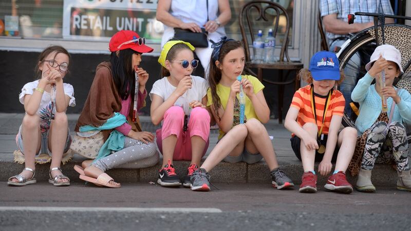 Anna Callaghy, Keira Ho, Lilly Mooney, Ruby Callaghy, Danny Mooney and Hazel Ho cool off at the Stoneybatter Festival, in Dublin on Sunday. Photograph: Dara Mac Dónaill