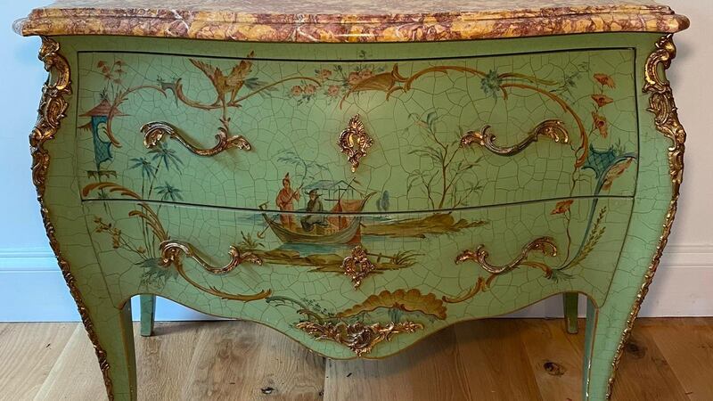 This French Louis XV-style light green Bombe Commode with painted chinoiserie decoration has very good quality ormolu mounts and a shaped dappled pink marble top over two drawers,  €1750, Ashbrook Antiques