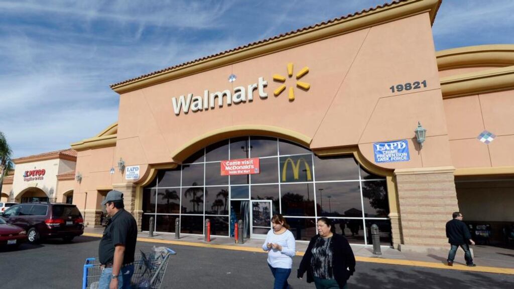 Wal-Mart expects earnings for the fourth quarter ending January 31st to be at or slightly below the low end of its previous forecast of $1.60 to $1.70 a share. Photograph: Kevork Djansezian/Reuters