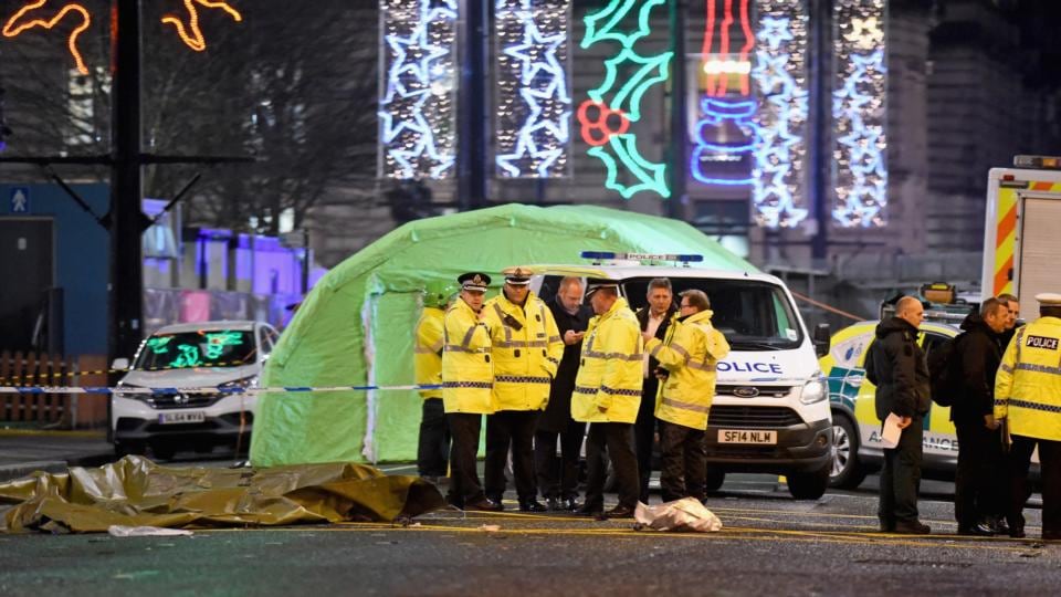 Police attend the scene of the crash in George Square in Glasgow in which six people were killed. Photograph: Jeff J Mitchell/Getty Images.