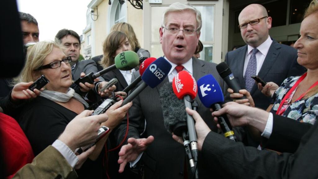 Eamon Gilmore answering reporters’ questions at a special meeting of the Labour Party. Photograph: Frank Miller