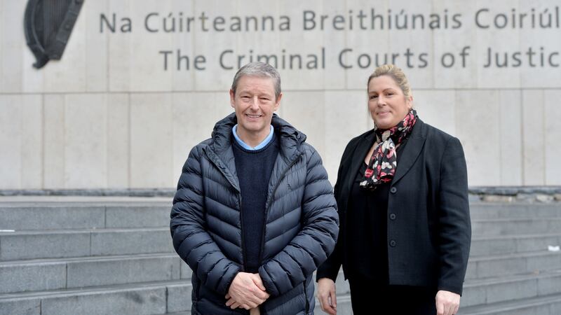Ireland’s first deaf juror Richard Dudley is photographed with interpreter Vanessa O’Connell at the Criminal Courts of Justice in Dublin. Photograph: Alan Betson/The Irish Times.