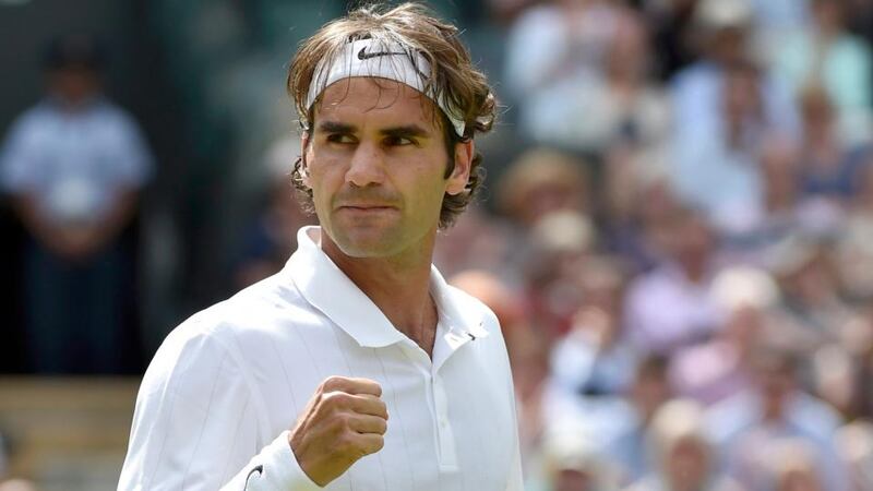 Roger Federer reacts after defeatingTommy Robredo of Spain in their men’s singles at Wimbledon. Photograph: Toby Melville/Reuters