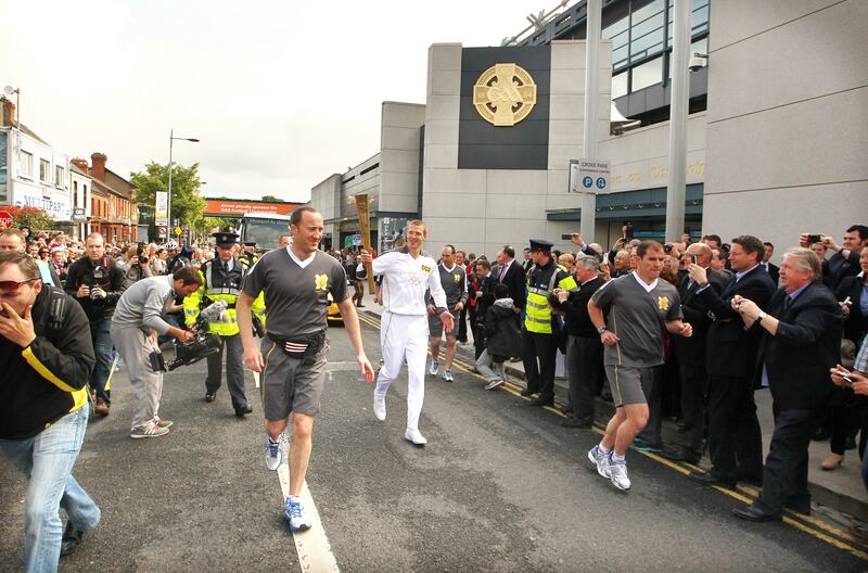 Kilkenny's Henry Shefflin leaves Croke Park with the Olympic torch ahead of the London Olympics in 2012. Photograph: James Crombie/Inpho