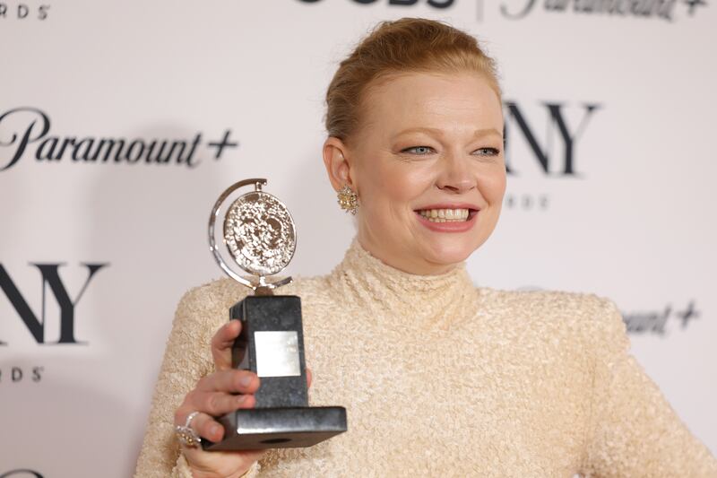 Sarah Snook poses with the Best Performance by an Actress in a Leading Role in a Play award for The Picture of Dorian Gray. Photograph: Mike Coppola/Getty Images for Tony Awards Productions